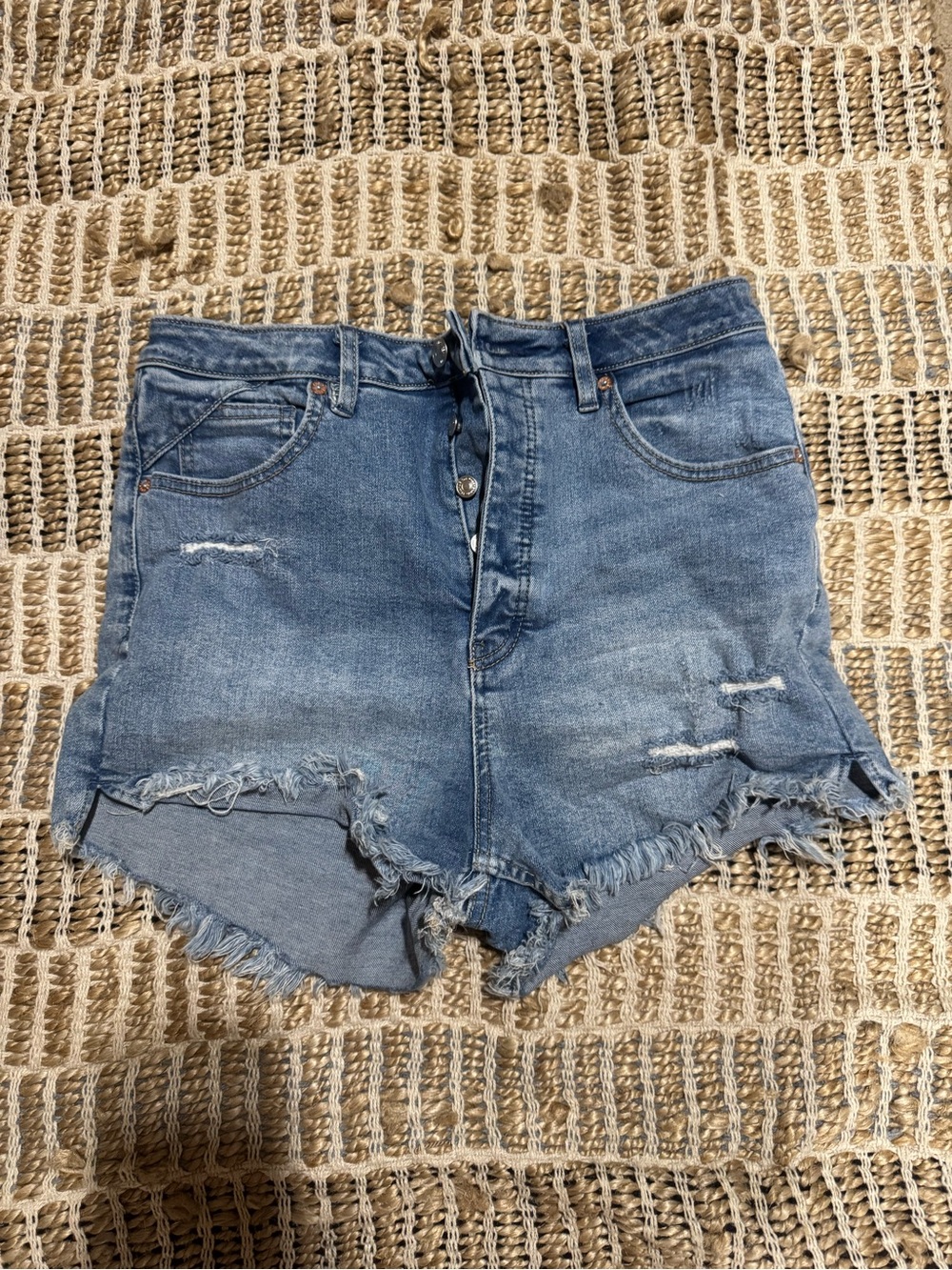 Free People High-Waist Distressed Denim Shorts in Medium Blue